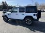 2018 White /Brown Jeep Wrangler JK Unlimited Sahara (1C4HJXEGXJW) with an 3.6L V6 DOHC 24V engine, 8-Speed Automatic transmission, located at 11115 Chardon Rd. , Chardon, OH, 44024, (440) 214-9705, 41.580246, -81.241943 - This 2018 Jeep Wrangler Unlimited Sahara is designed to provide both rugged off-road capability and modern comfort. It is powered by a 3.6-liter Pentastar V6 engine, which is paired with an 8-speed automatic transmission, offering robust performance and smooth shifting. The interior features a leath - Photo#11