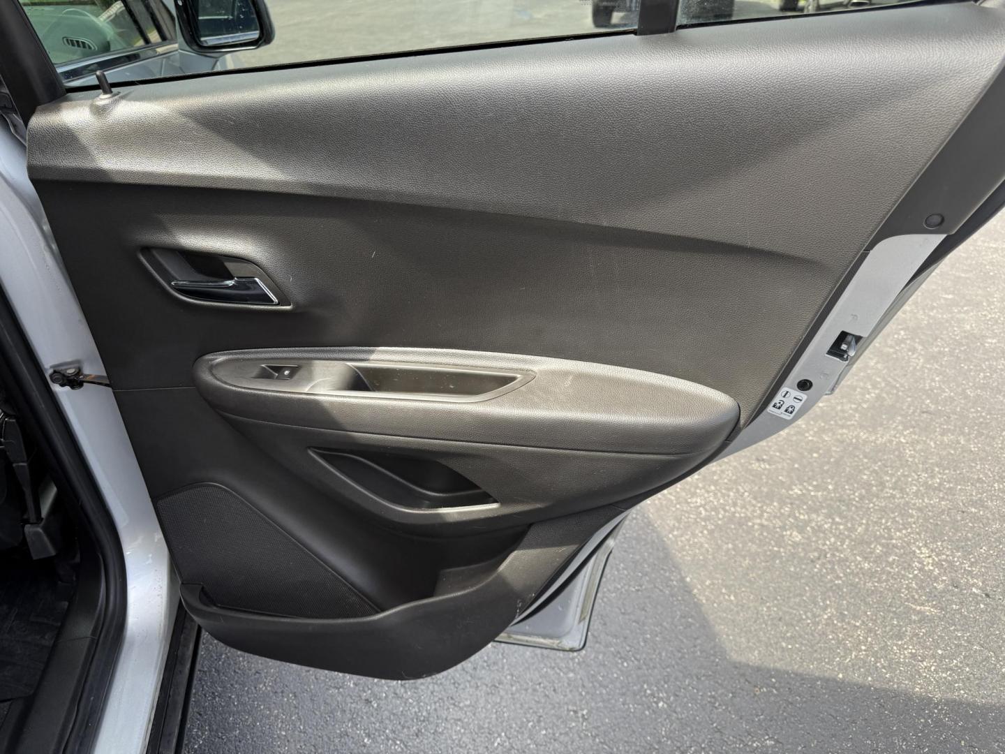 2017 Silver /Black Chevrolet Trax LT AWD (KL7CJPSB3HB) with an 1.4L I4 DOHC 16V Turbo engine, 6A transmission, located at 11115 Chardon Rd. , Chardon, OH, 44024, (440) 214-9705, 41.580246, -81.241943 - This 2017 Chevrolet Trax LT AWD features a versatile and efficient 1.4-liter turbocharged EcoTec I4 engine paired with a 6-speed automatic transmission, providing a practical driving experience with a fuel efficiency of up to 30 MPG on the highway. It comes equipped with modern conveniences such as - Photo#30