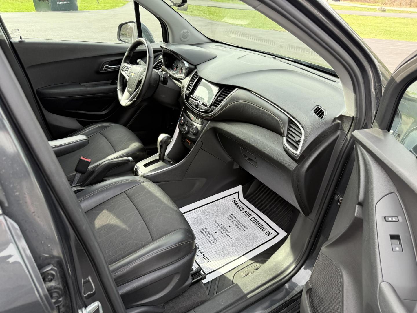2017 Gray /Black Chevrolet Trax LT FWD (3GNCJLSB8HL) with an 1.4L I4 DOHC 16V Turbo engine, 6A transmission, located at 11115 Chardon Rd. , Chardon, OH, 44024, (440) 214-9705, 41.580246, -81.241943 - This One Owner 2017 Chevrolet Trax is a fuel efficient low miles SUV. Equipped with a 1.4-liter I4 turbocharged EcoTec engine and a 6-speed automatic transmission, providing a balance of efficiency and performance. Notable features include a power driver's seat, remote start for added convenience, a - Photo#38